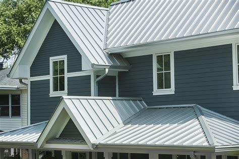 pictures of houses with silver metal roofs|tin colors for homes.